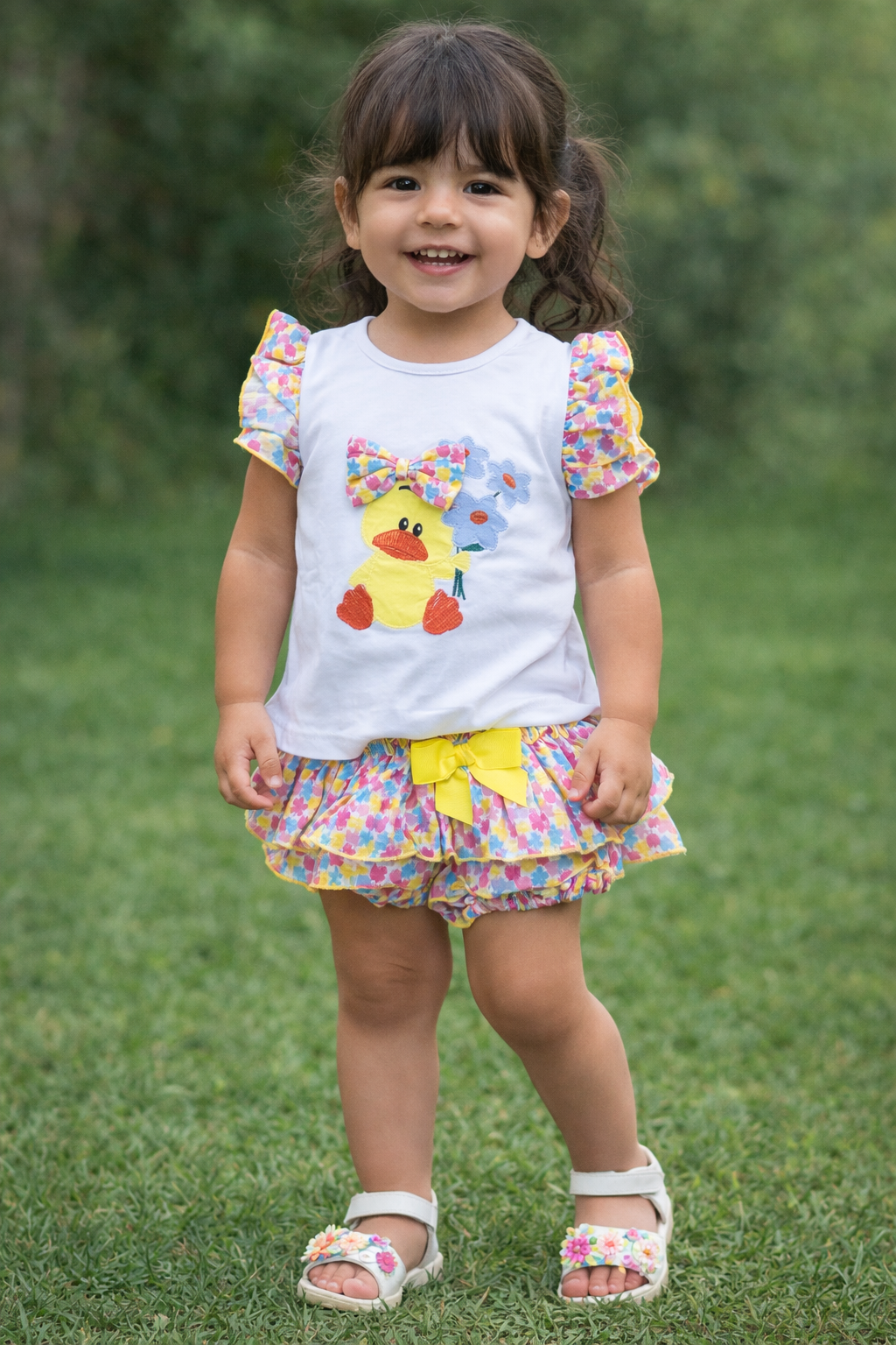 Conjunto pato flores