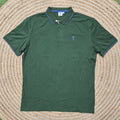 Polo golf verde oscuro