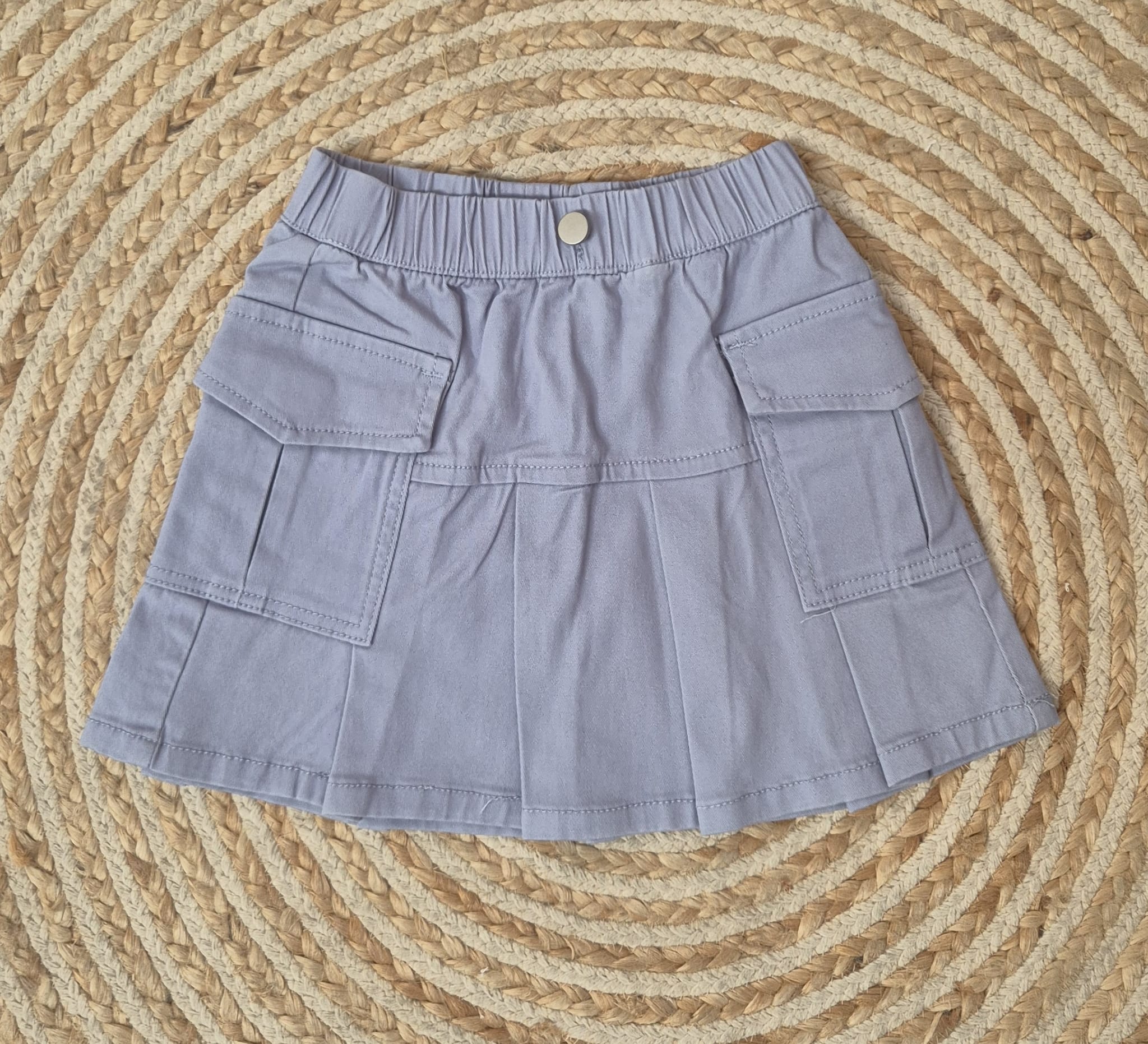 Falda bolsillos azul